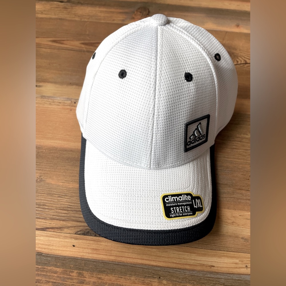 New in package! Adidas White with black trim baseball cap
